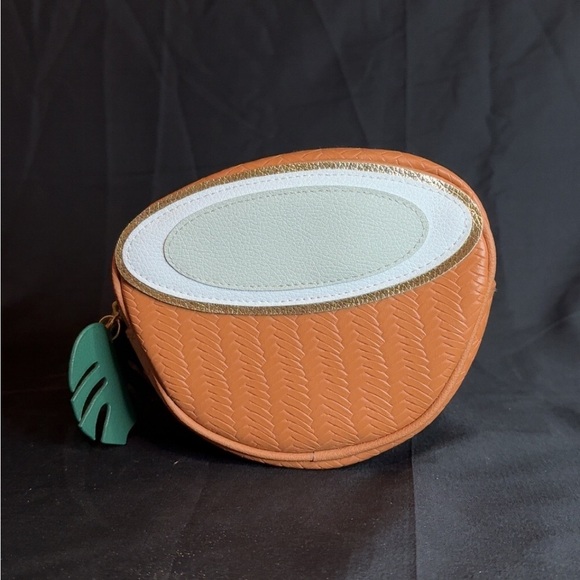Bath & Body Works Handbags - Bath & Body Works Coconut Shaped Tan and White Cosmetic Bag